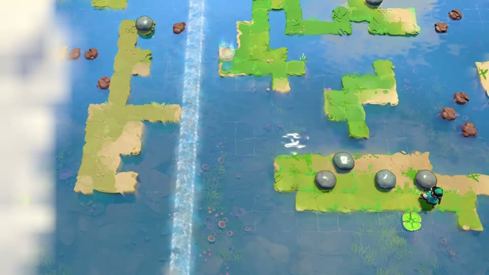 Several stones line a long green island on the right. A small island sits above it, and a tall current runs beside a narrow western bank.